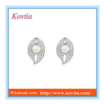 Chine top dix produits de vente fantaisie forme de la feuille boucles d&#39;oreille en cristal imitation boucles d&#39;oreilles en perle cz boucles d&#39;oreille en diamant